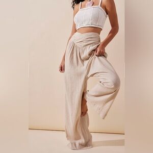 Free people “pack me up pants”. SUPER comfy only worn a couple times.